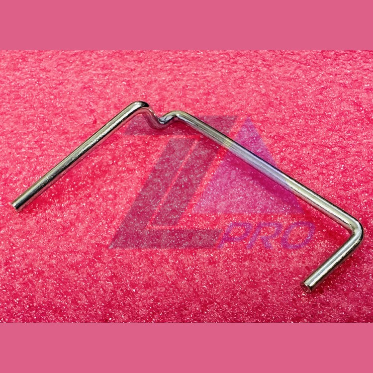 Пружина оси палеты траволатора правая GAA94BF1 Otis