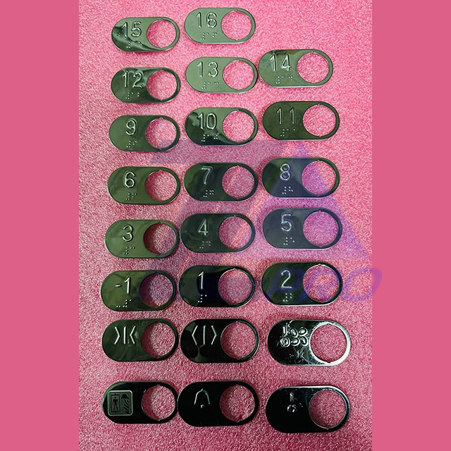 Чиклет овальный с кодом Брайля, тёмная зеркальная поверхность, отверстие 27.5 мм, Gen2 CAA396BN Otis